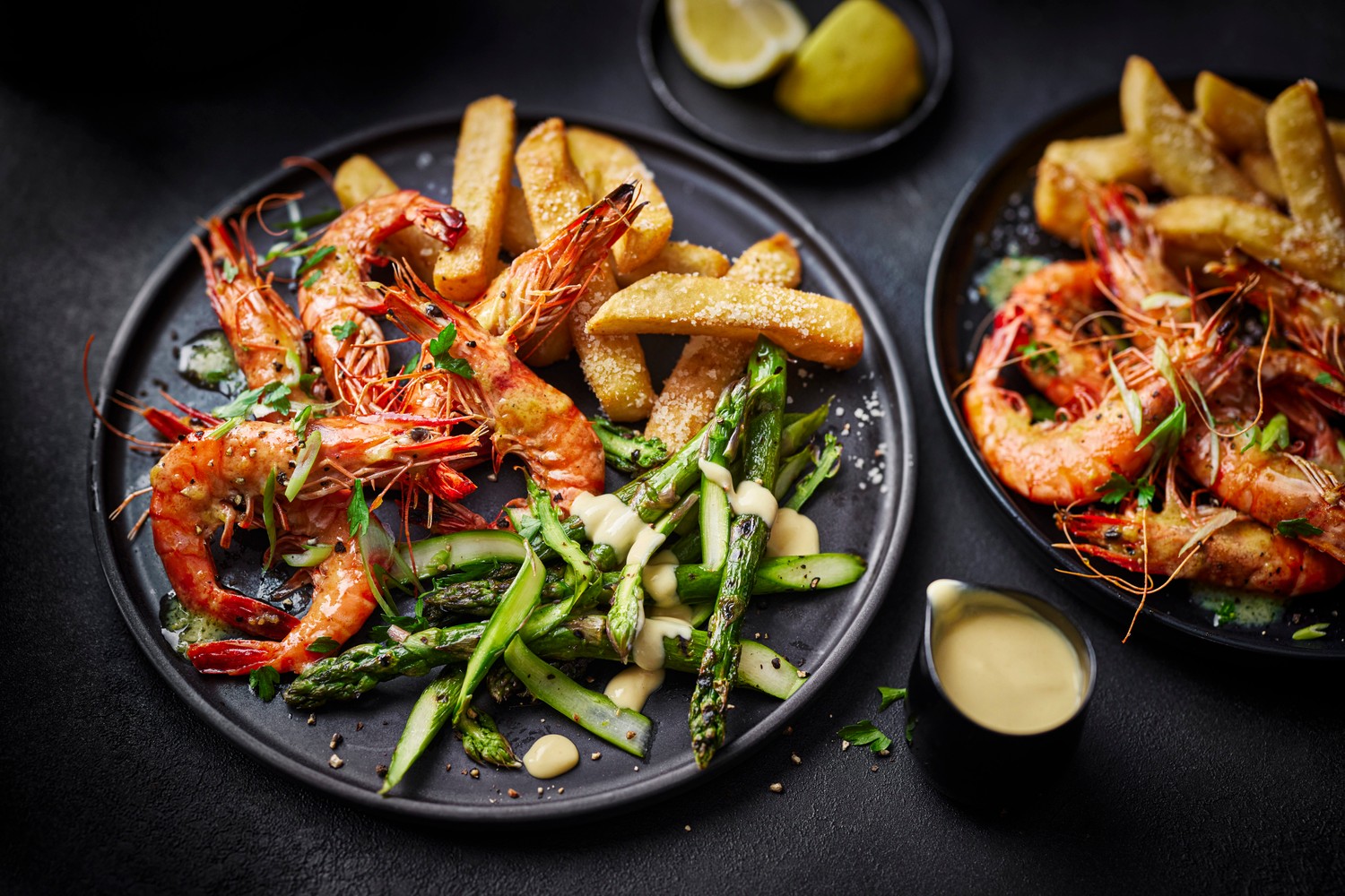 Garlic butter prawns with triple-cooked chips and lemon hollandaise