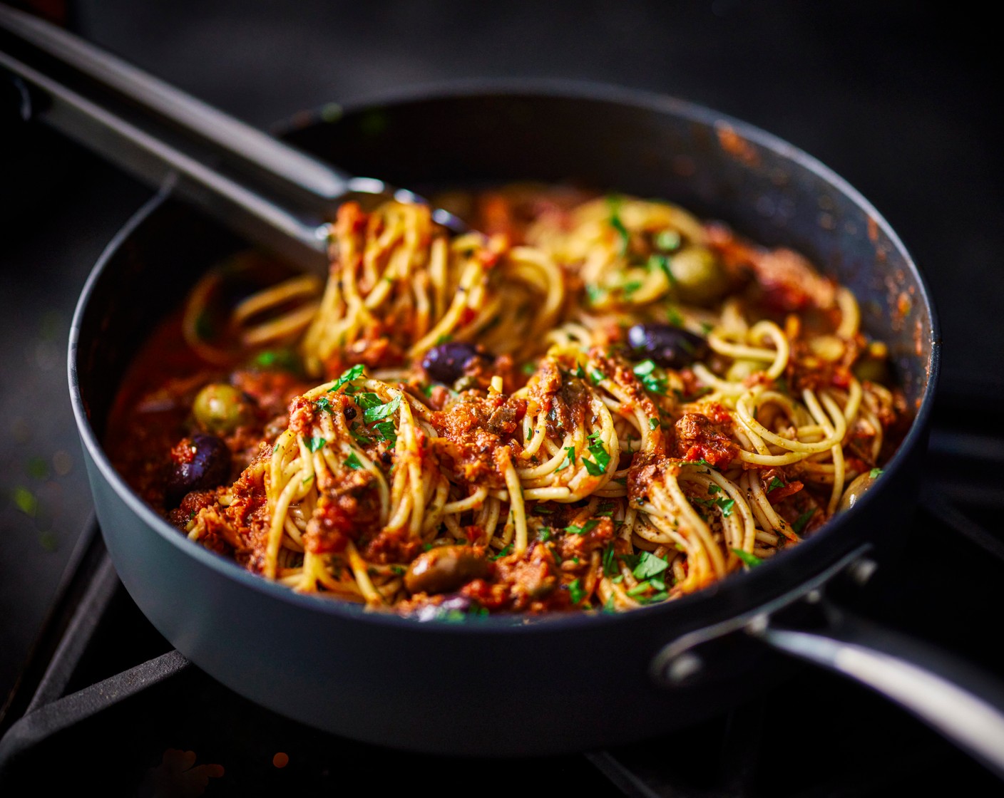step 3 Add the cooked spaghetti to the sauce and toss until well-coated. Add in a splash of pasta water if needed to create a glossy sauce. Remove from the heat, stir through the parsley (15 g) and serve.