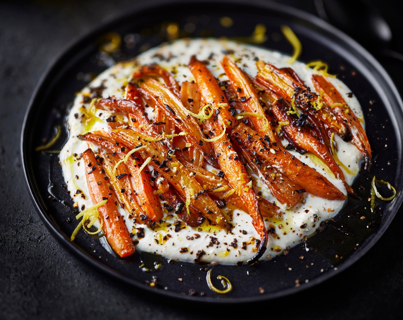 step 4 Arrange the carrots on a platter, dotting the feta in and around. Finish with extra lemon zest and ancho chilli flakes (1 tsp).