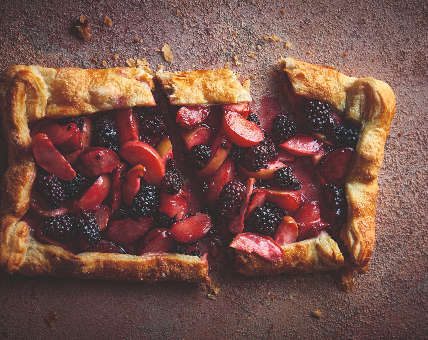 step 5 Remove the baking sheet from the oven. Carefully slide the galette onto the baking sheet, keeping it on its parchment, then place it back into the oven and bake for 35 minutes, until the pastry is golden and crispy. Cut into slices and serve warm with vanilla ice cream.