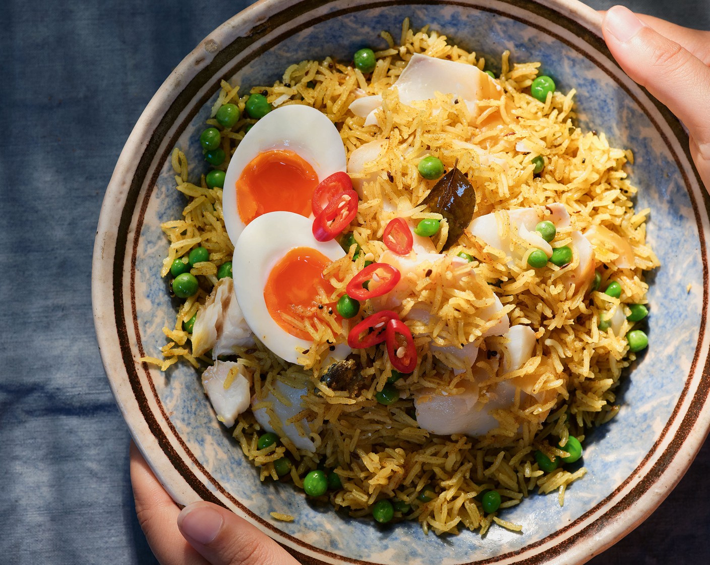 step 7 Divide the kedgeree between warmed serving bowls and top each serving with halved or quartered boiled eggs. Finish with a scattering of red chilli (1).

Recipe from Tom Kerridge Cooks Britain: a Journey Through the Best of British Food (£25, Bloomsbury), available online at Ocado and in selected M&S stores.