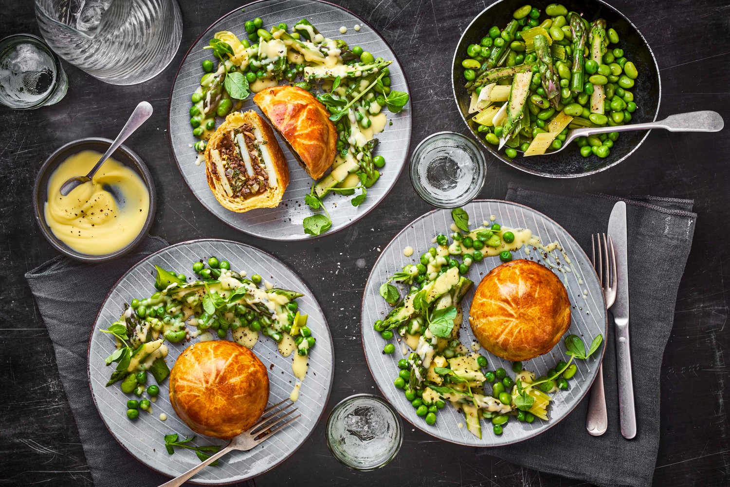 Potato, porcini and Comté pithivier with a beurre blanc and spring vegetables
