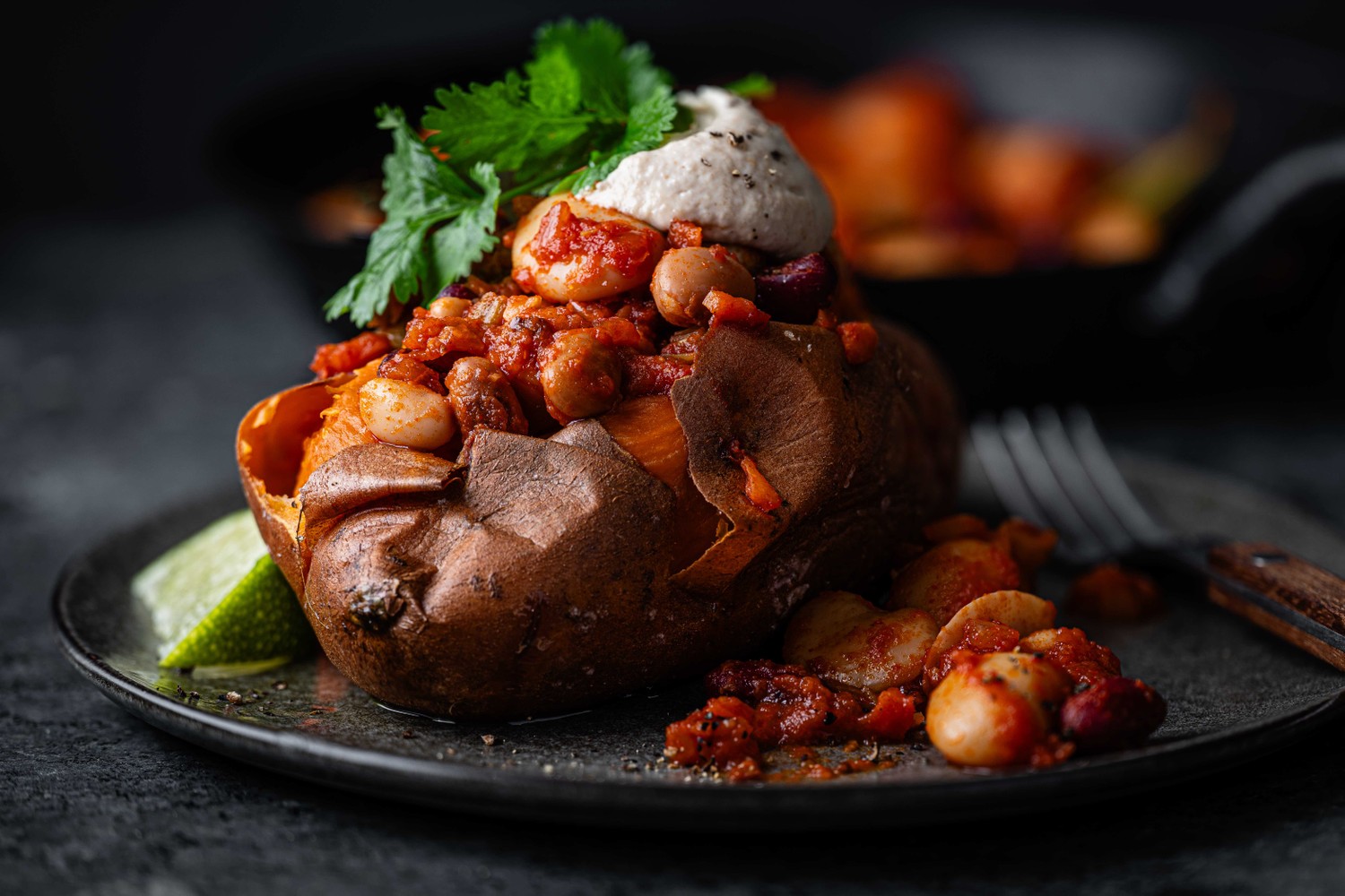 High fibre baked sweet potatoes with smoky beans and whipped tahini recipe