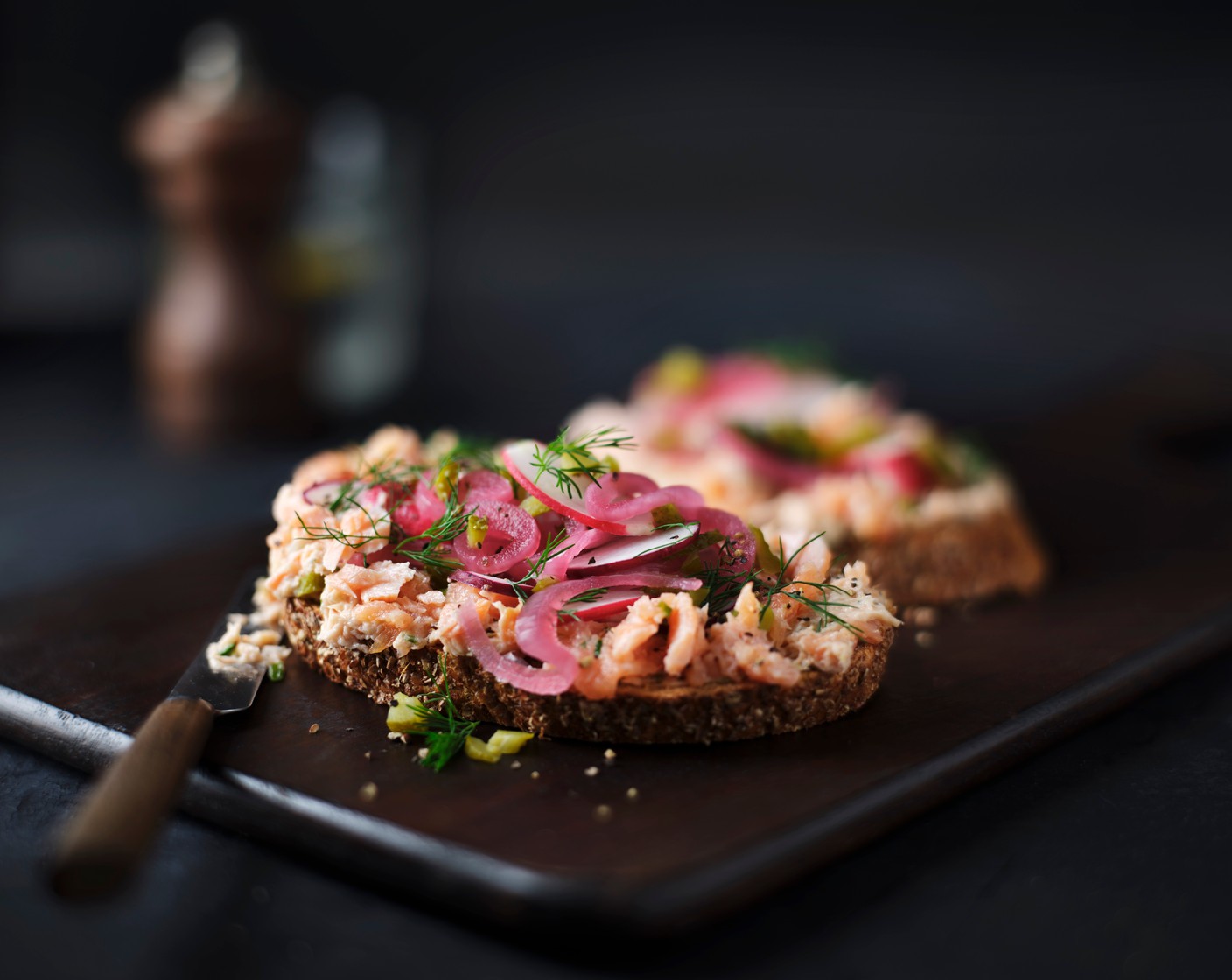 step 1 Toast the bread (4 slices) and spread each slice with the smoked salmon pâté (1 tub). Top with the pickled onions (1 tbsp), radishes (8), cornichons (4) and a little fresh dill (10 g). Finish with a grind of pepper and dig in.