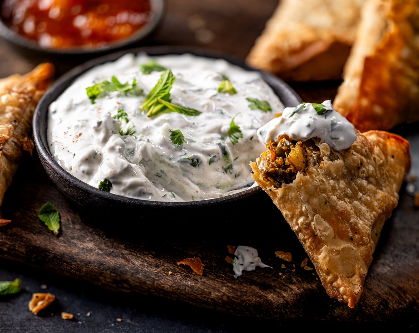 step 3 Serve the raita with the samosas, poppadoms (1 bag) and mango chutney (2 tbsp).