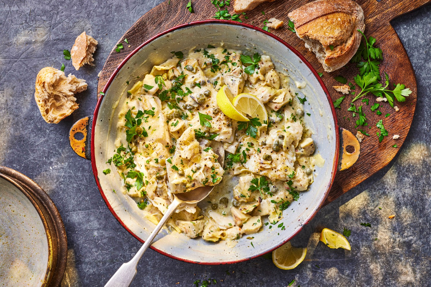 One-pan summer haddock with capers and artichokes