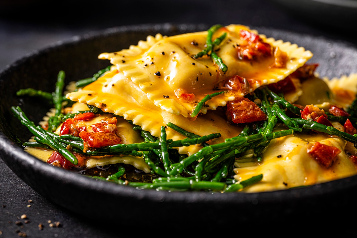 Crab and prawn agnolotti with samphire and chilli butter