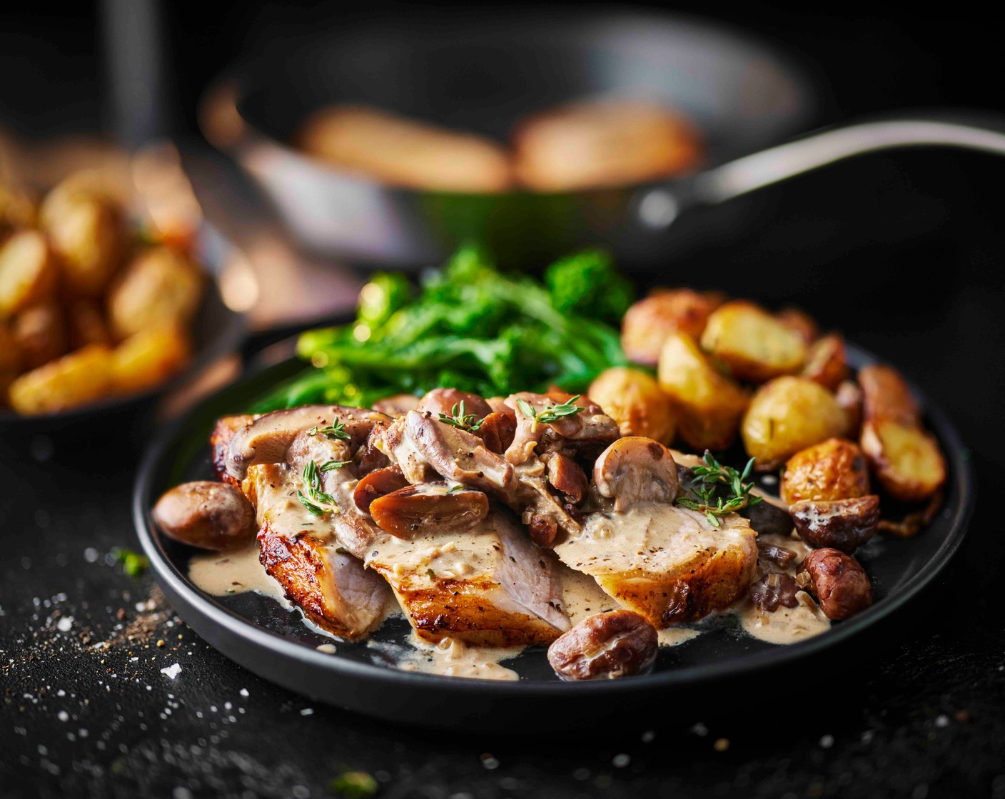 step 8 Slice the pork steaks thickly and divide between plates. Spoon over the chestnut and mushroom sauce and serve with the crispy potatoes.