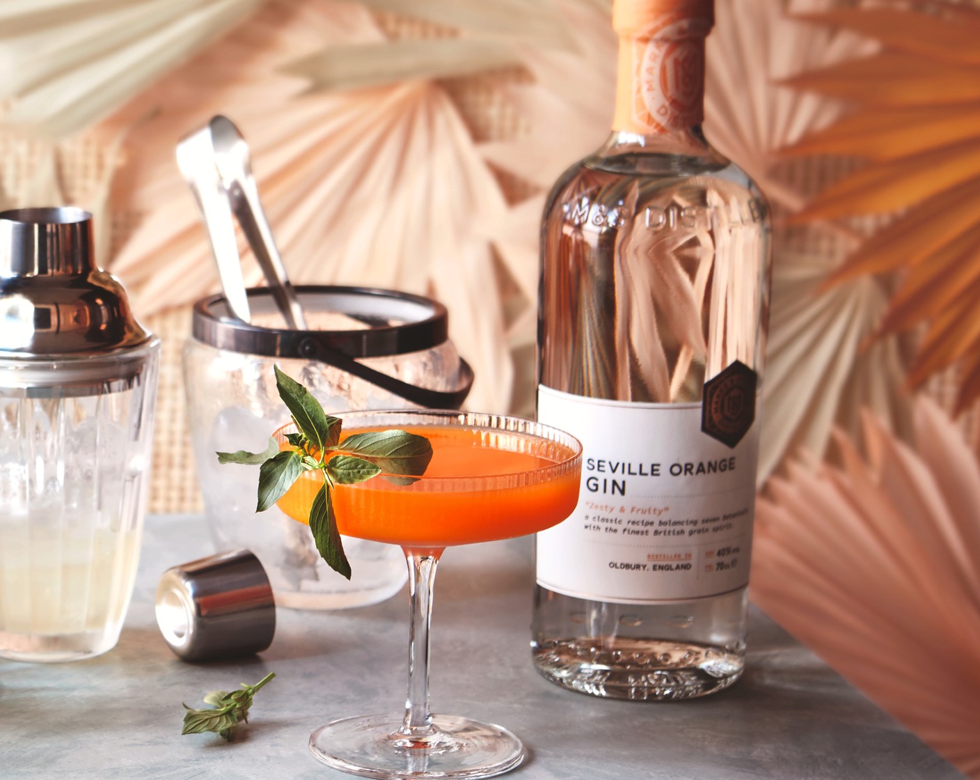 step 4 Strain into a martini or coupe glass and garnish with the sprig Thai basil (1 sprig).