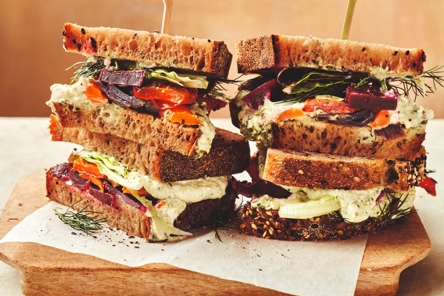 Roasted carrot, beetroot and herby green feta sandwiches