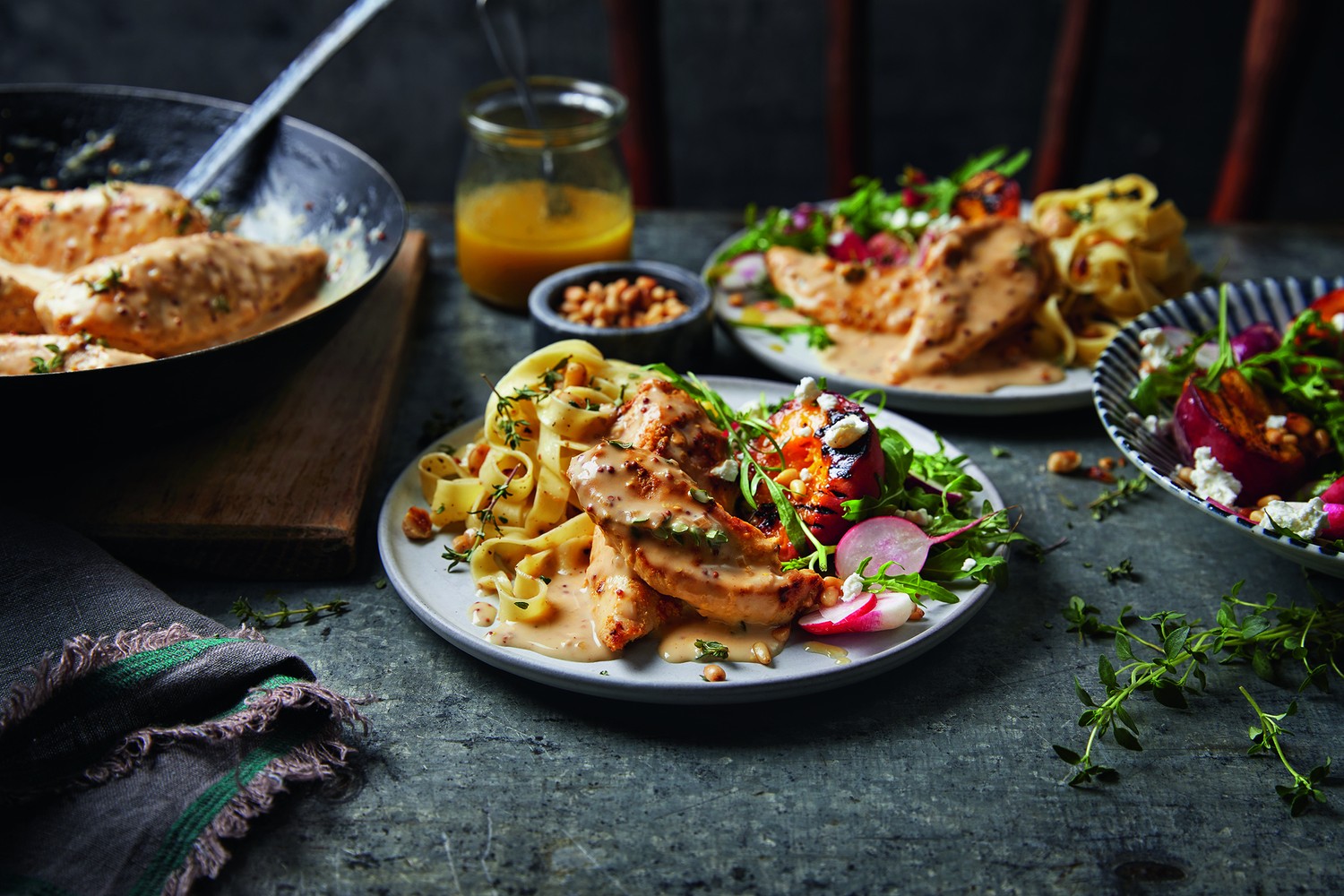 Chicken a la moutarde, pasta with hazelnut butter and a peach and pine nut salad