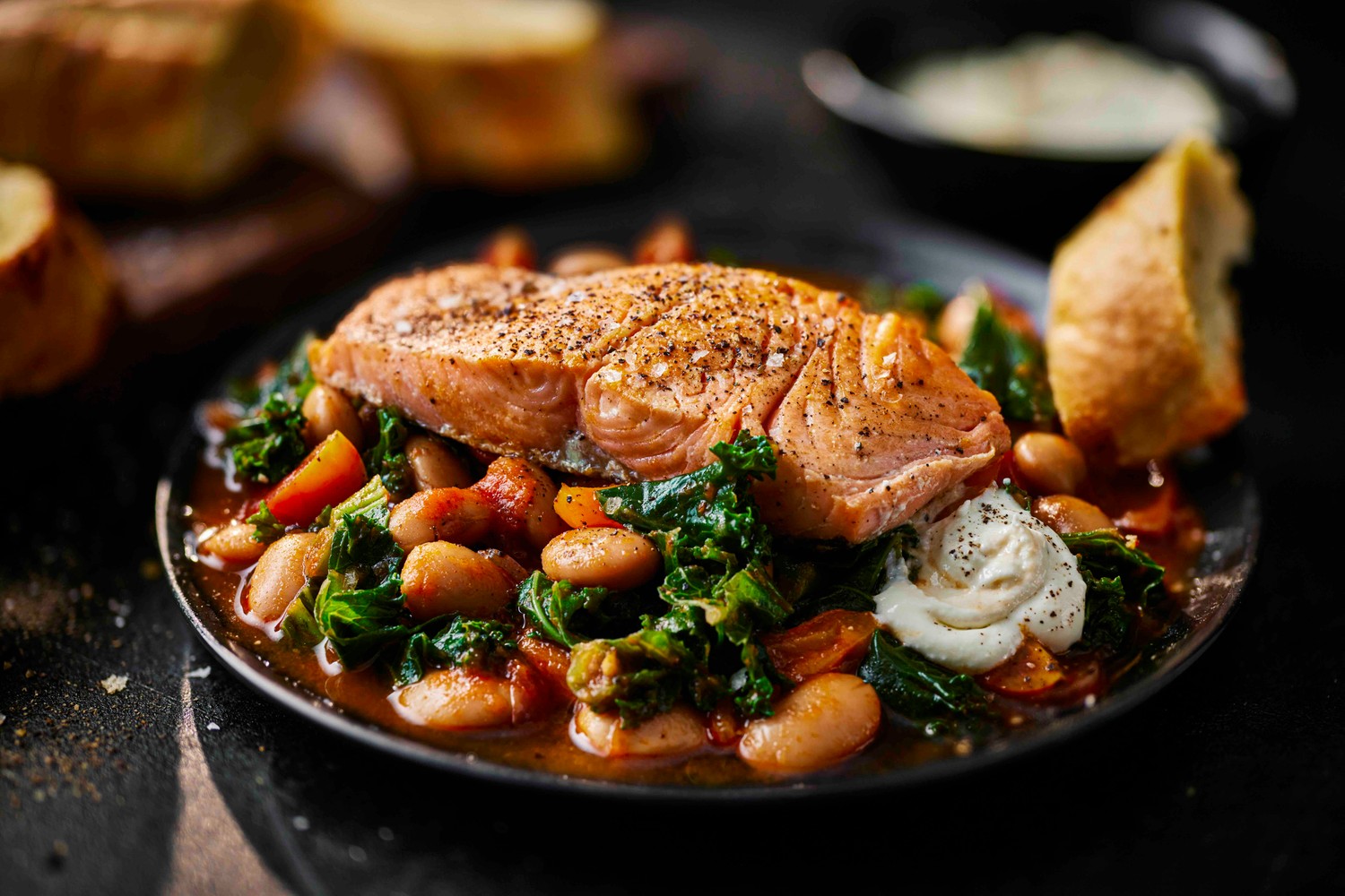 Salmon with saucy tomato beans