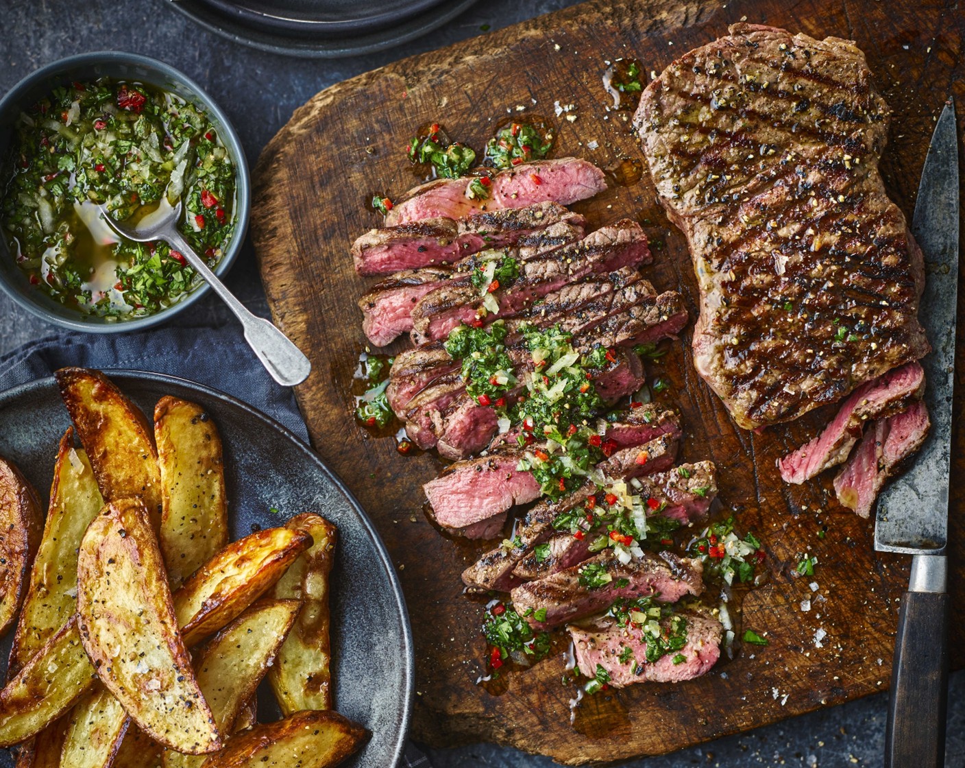 step 6 Remove the steaks from the griddle pan and set aside on a plate for a few minutes. Thickly slice the steaks, then place onto serving plates along with the wedges. Spoon the chimichurri over the steaks to serve.