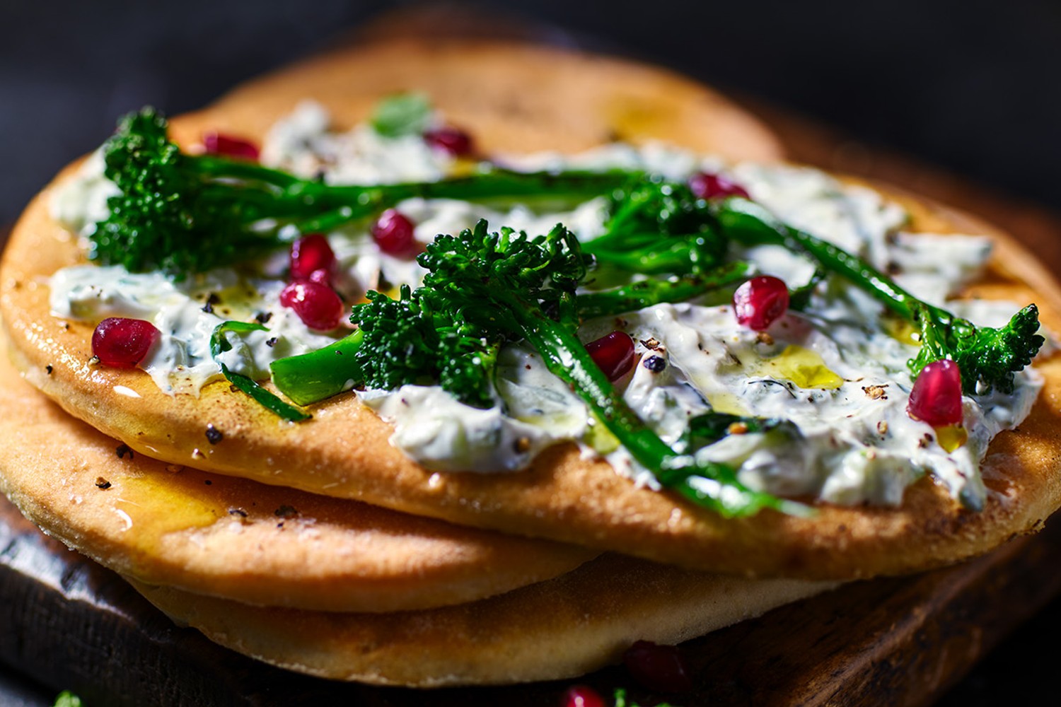 Grilled Tenderstem, tzatziki and pomegranate flatbreads recipe