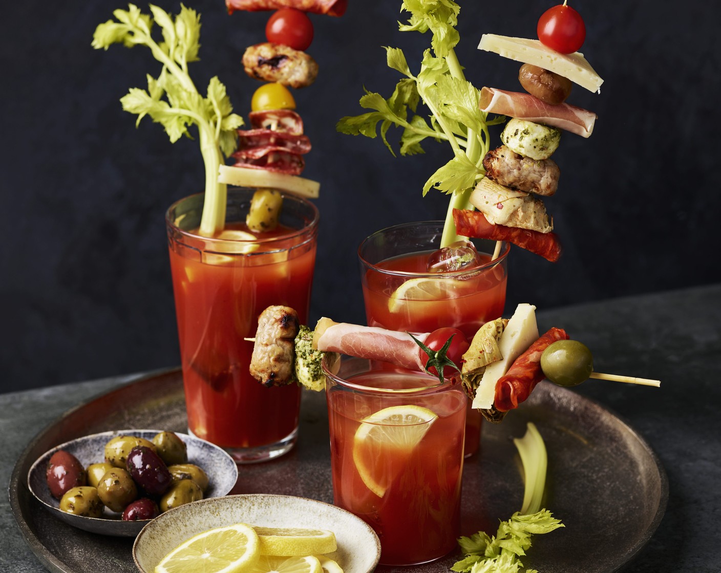 step 2 Time to have fun: start with the usual celery stick and build from there. Why not try adding things like olives, cornichons, sweet silverskin onions, Collection antipasti and cheese grazing platter, our dinky dunkers… anything that will fit on a skewer basically. The only limit is your imagination.