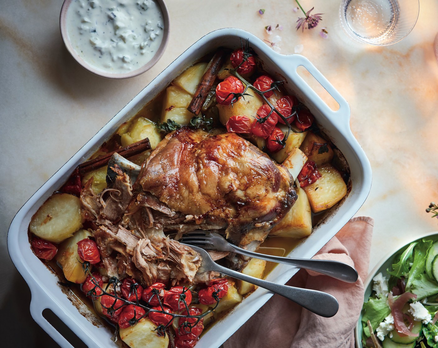 step 5 Divide the kleftiko between serving dishes. Serve each with some of the salad and a good dollop of tzatziki (4 tbsp).