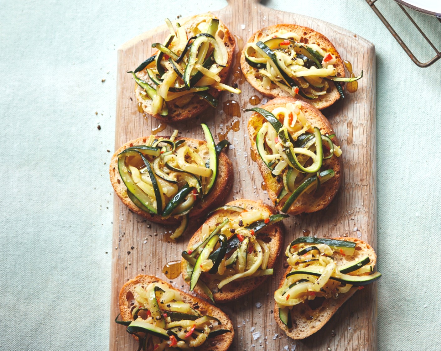 step 3 Serve the slow-cooked courgette on top of the sourdough toasts as a starter or canapé.