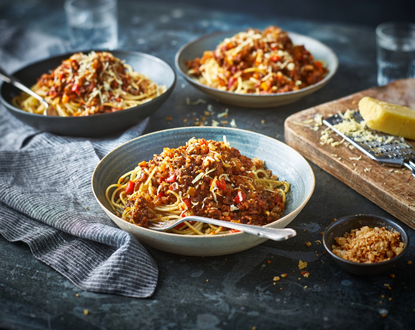 step 5 Cook the spaghetti (500 g) according to the pack instructions. Serve topped with the mince, garlicky crumb and mature cheddar (to taste).
