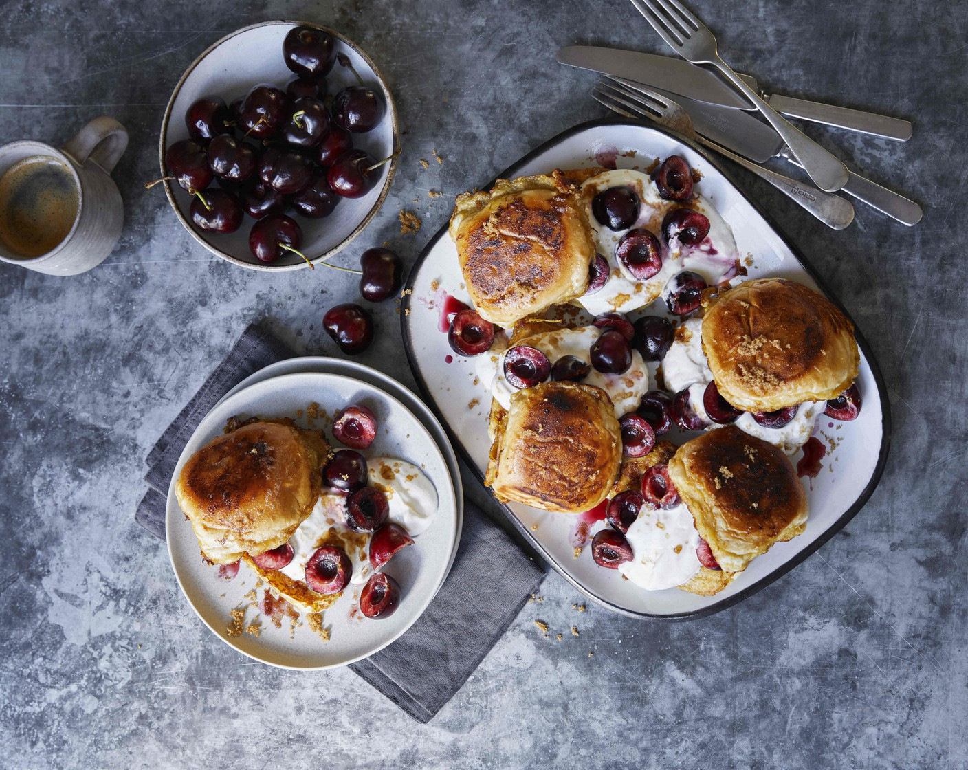 step 5 To serve, place a piece of the French toast onto each plate, then add the crème fraîche (200 ml) and cherries on top before sprinkling with a little more soft light brown sugar (60 g) if desired and finishing with a roll lid.