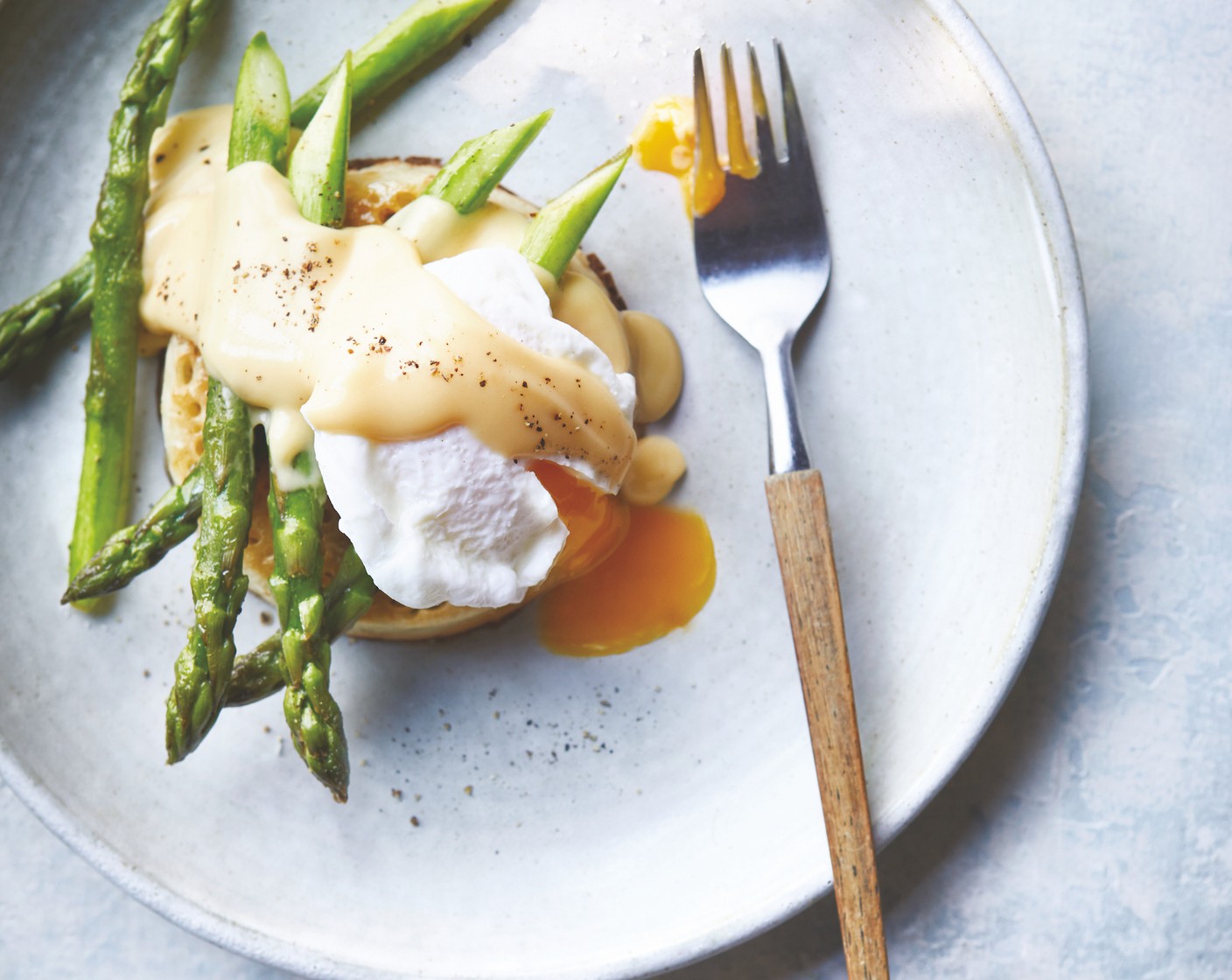 step 3 Place the M&S ultimate crumpets (2) into a toaster or under the grill, heat the Cook With M&S M&S hollandaise sauce (1 tub) sauce as per the packet instructions, then assemble the asparagus, eggs and sauce on top of each crumpet.