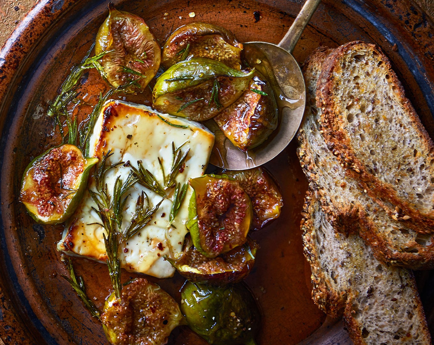 step 2 Bake for 15 minutes, then remove from the oven and drizzle over the honey (2 tbsp). Return to the oven for a further 10 minutes, until the figs have softened and the feta is golden. Serve with salad leaves or fresh sourdough (4 slices).