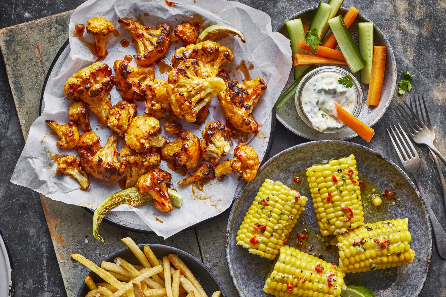 Buffalo cauliflower wings with creamy ranch and zesty corn