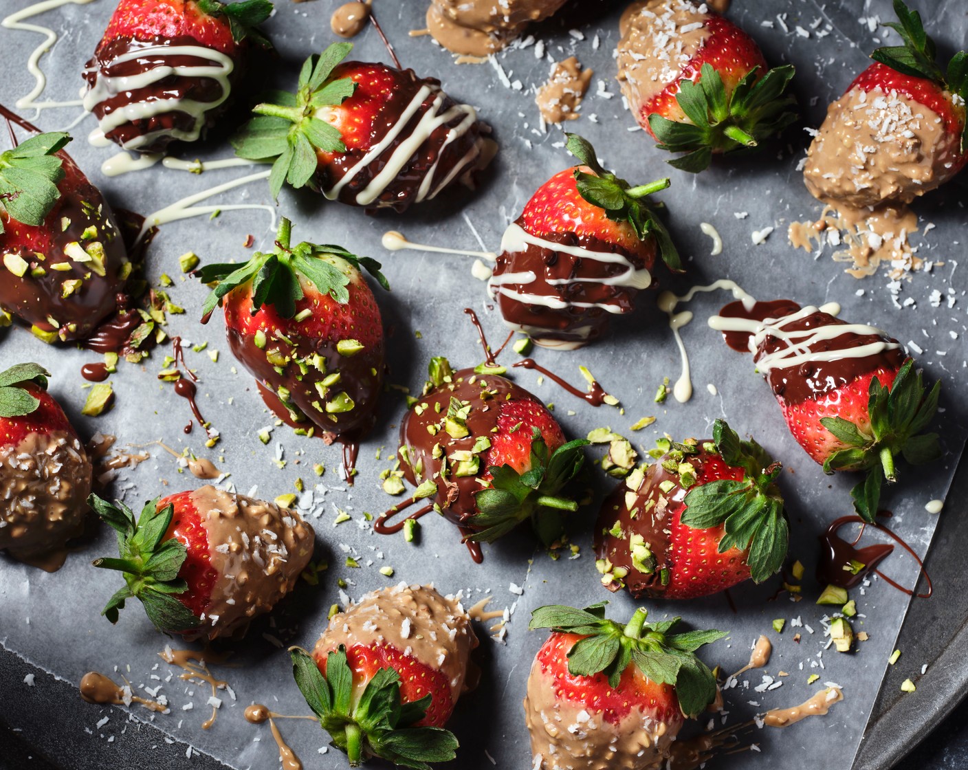 step 12 Once the chocolate-covered strawberries have set, remove them from the fridge and use a teaspoon to lightly drizzle the white chocolate over the strawberries until they resemble stripes.