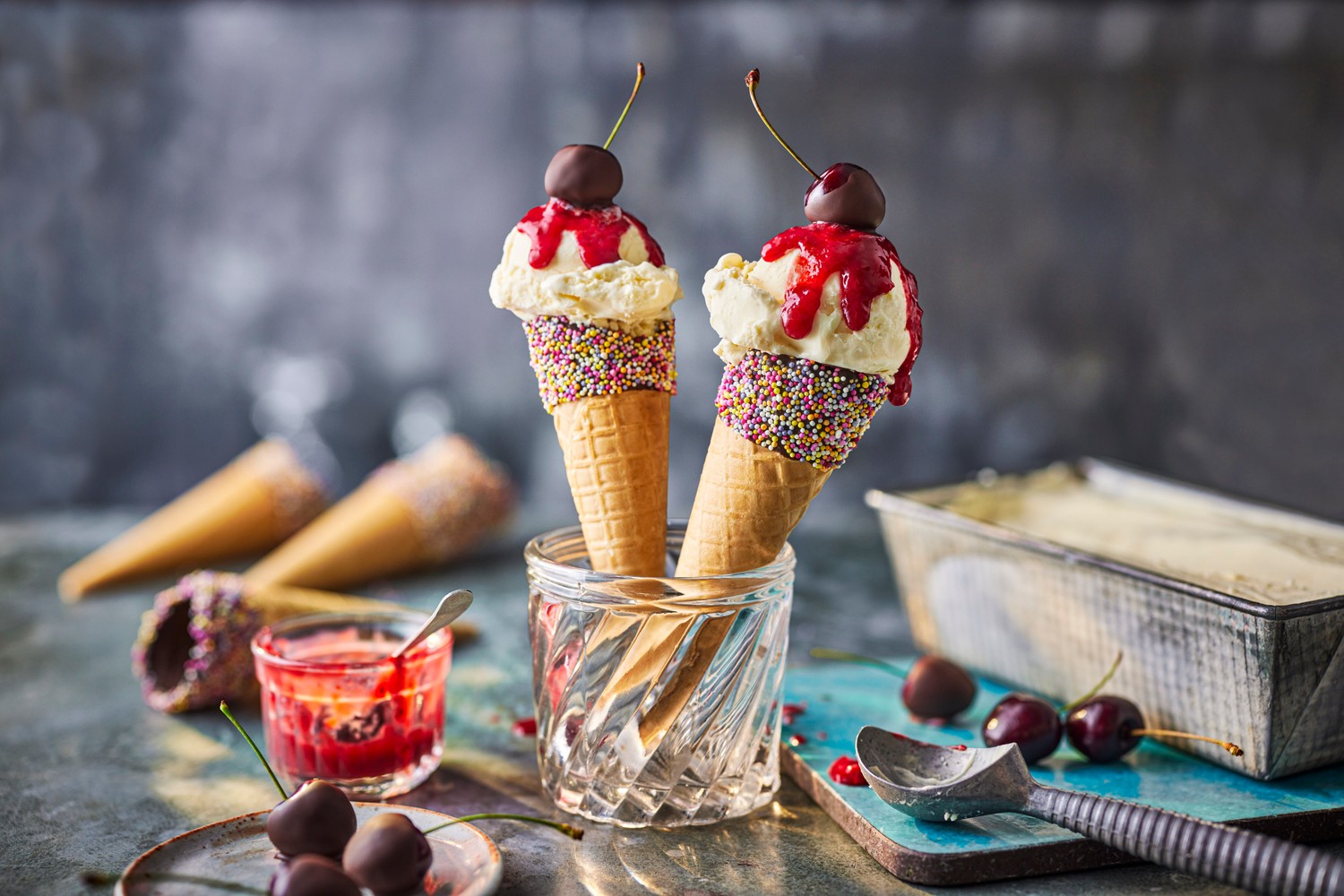 No-churn ice-cream rainbow cones with chocolate cherries