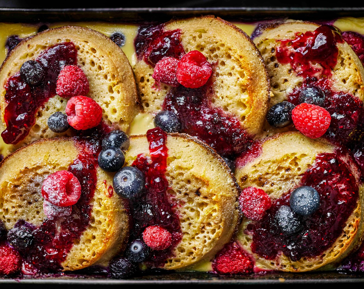 step 4 Leave to stand for 5-10 minutes to firm up slightly. Dust with icing sugar (as needed) and serve warm with extra berries.