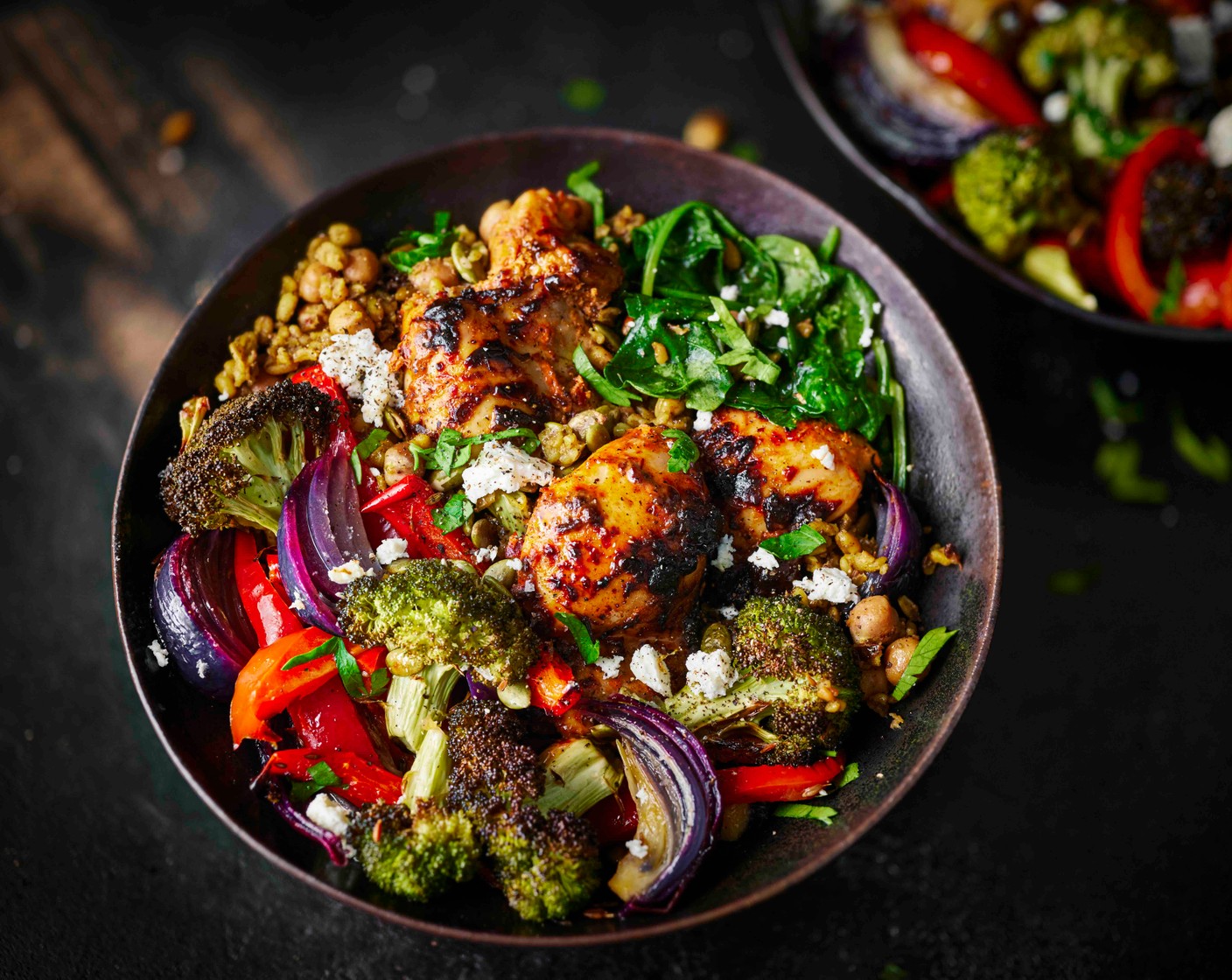 step 7 Serve the grains alongside the sliced chicken and veg. Top with pumpkin seeds, crumbled feta (100 g), a drizzle of yogurt (2 tbsp), the remaining lemon juice (1/2) and parsley (10 g).