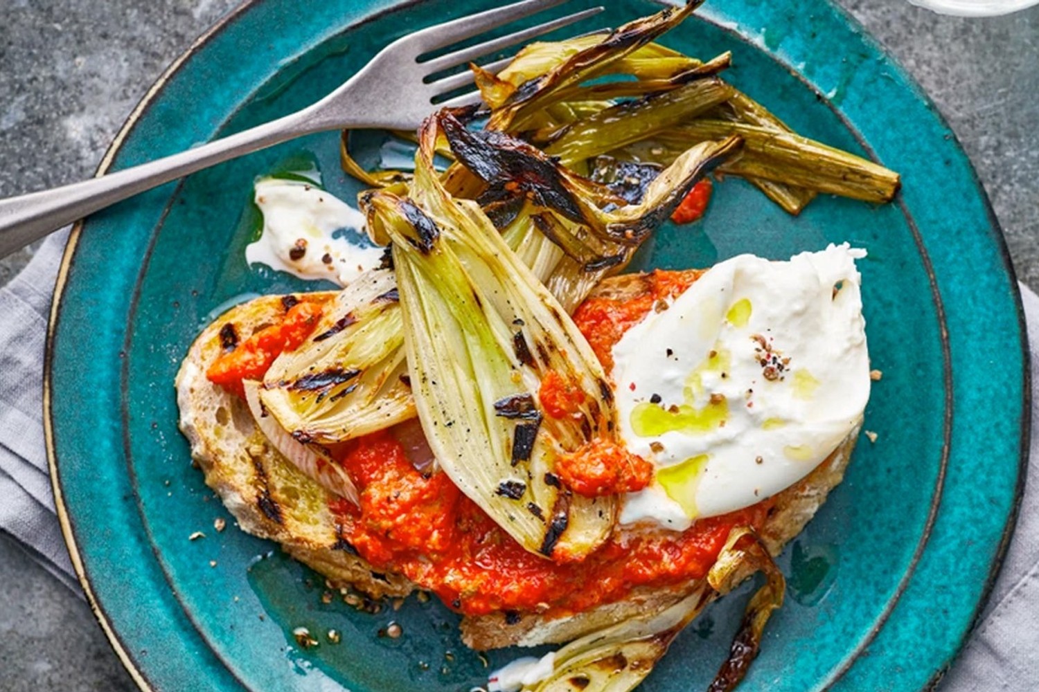 Charred spring onions with roasted red pepper dip and burrata