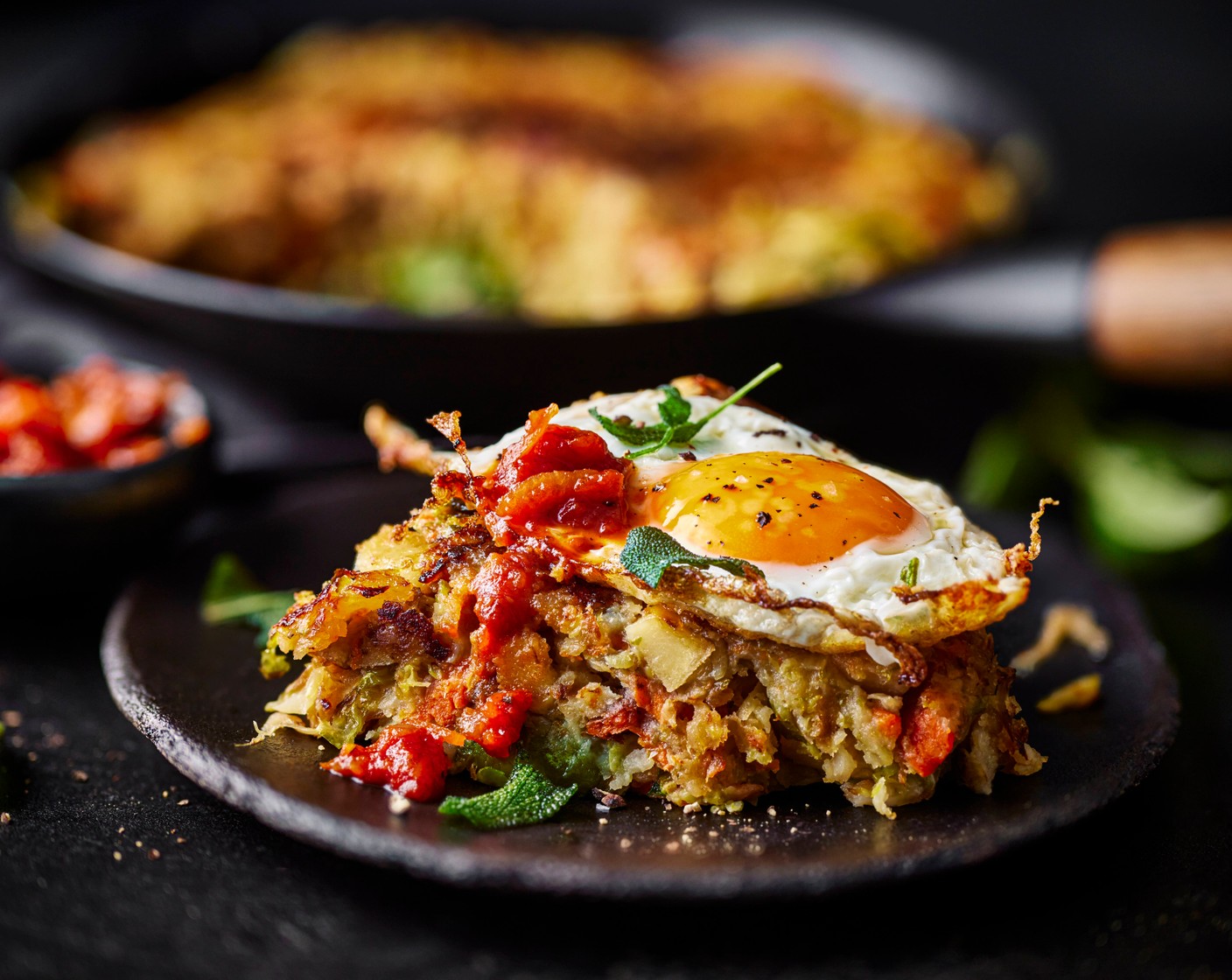 step 6 Remove the bubble and squeak from the oven and cut into slices. Serve each topped with the sage fried eggs and a dollop of Bloody Mary chtuney (2 tbsp).