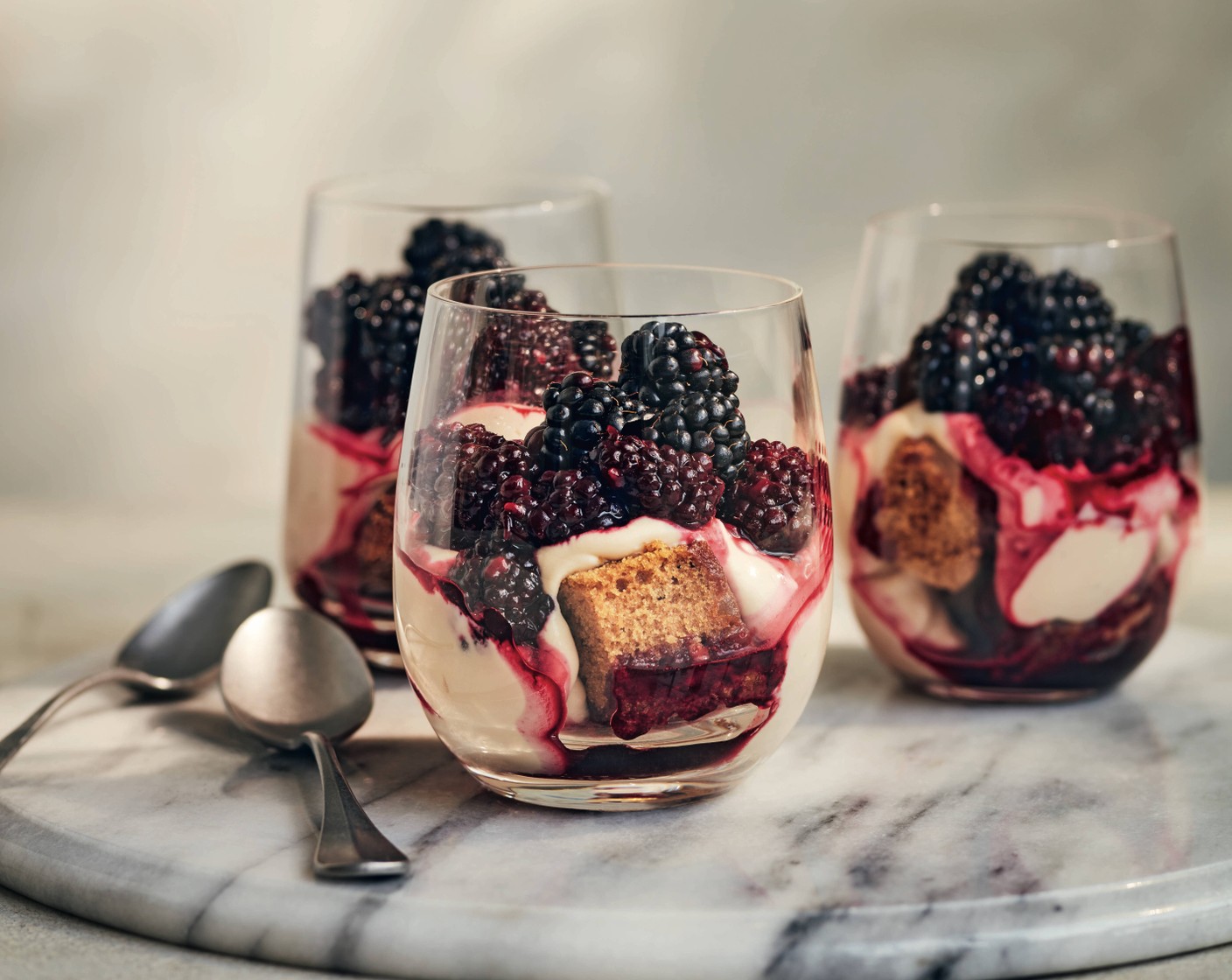 step 3 Layer up the ginger loaf (1), mascarpone cream, blackberry compote and fresh blackberries (100 g) in five medium-sized glasses. Chill the trifles for a minimum of 5 hours before serving.