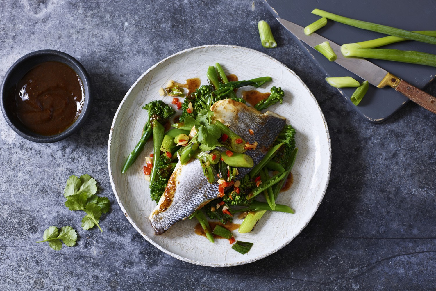 Soy, ginger and garlic steamed sea bass