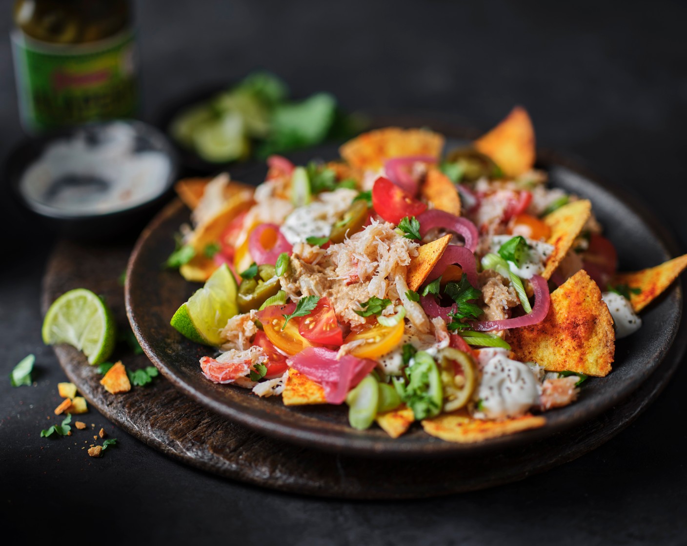 step 5 Finish with the fresh coriander (10 g) and serve with the lime (1), cut into wedges, for squeezing on top.