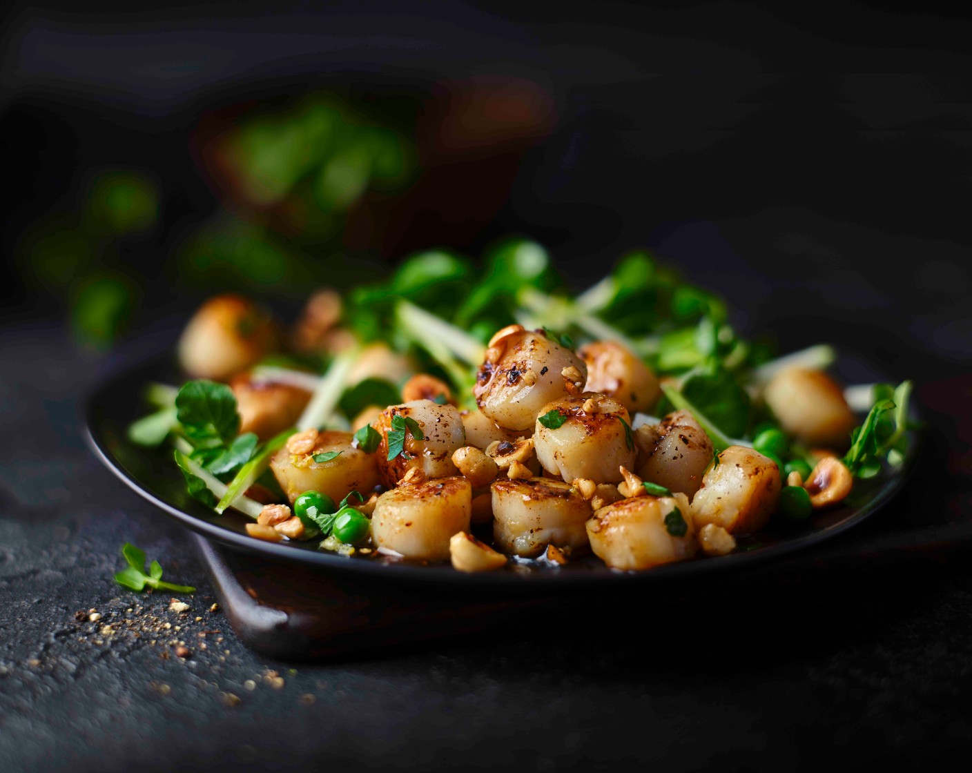 step 5 Serve the scallops with the salad and a drizzle of the hazelnut brown butter from the pan. Finish with the reserved lemon zest.