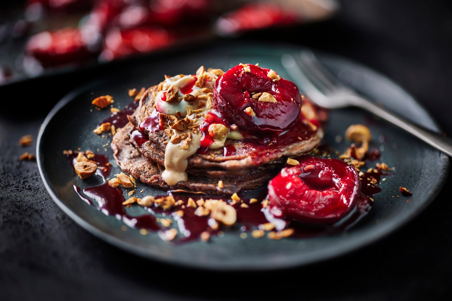 Roasted plum and hazelnut pancakes