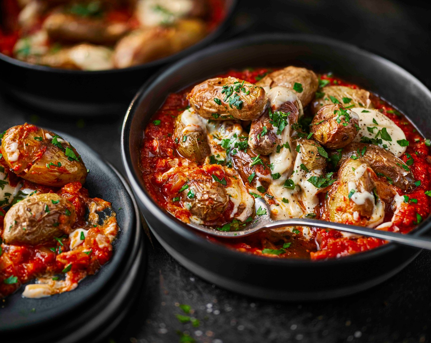 step 4 Spoon the sauce into a shallow serving dish. Top with the crispy potatoes, scatter over the parsley (5 g) and finish with a dollop of aioli (4 tbsp).