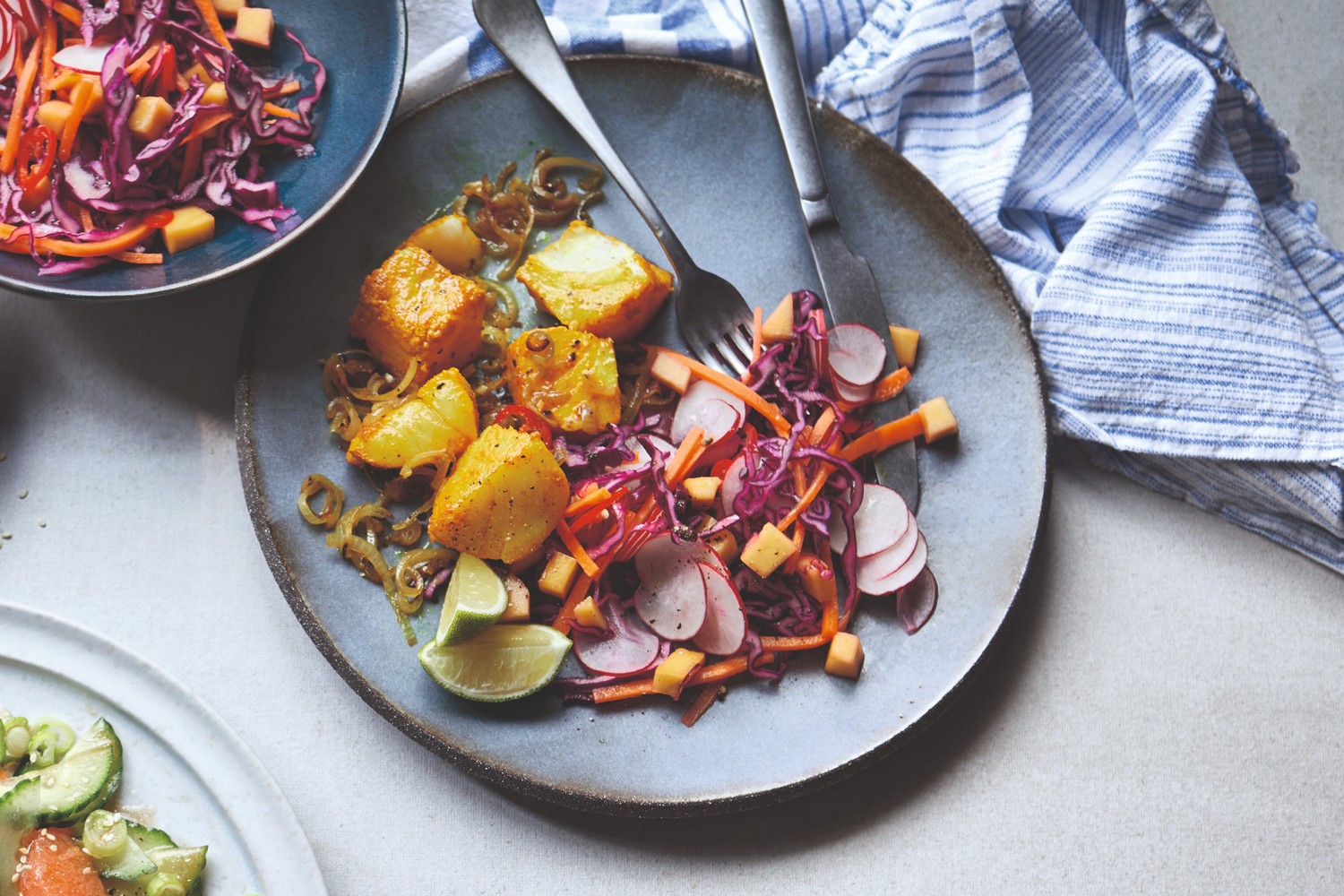 Turmeric-spiced cod with sweet and spicy salad