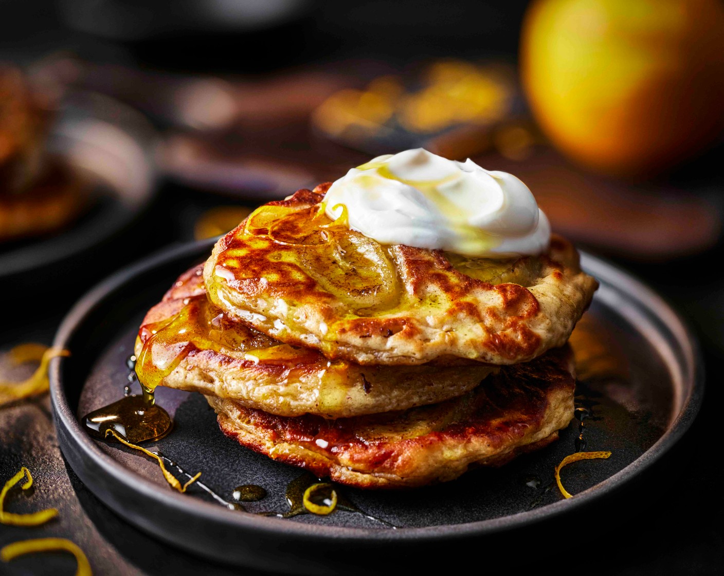 step 6 Serve with a dollop of extra extra yogurt, a drizzle of honey and an extra grating of orange zest (1/2)