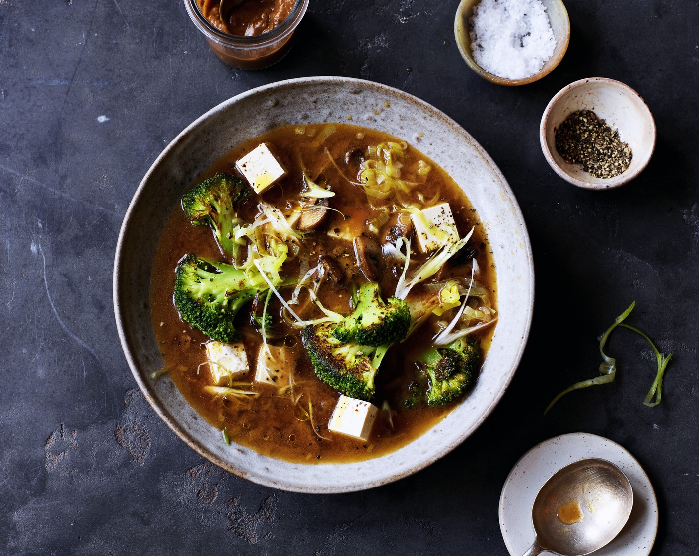 step 3 Add the M&S Plant Kitchen super firm tofu (300 g) and M&S Remarkable Value broccoli (1 head) and heat through. Divide between serving bowls, add a drizzle of sesame oil (as needed) to each one and scatter with M&S spring onions (2) to serve.