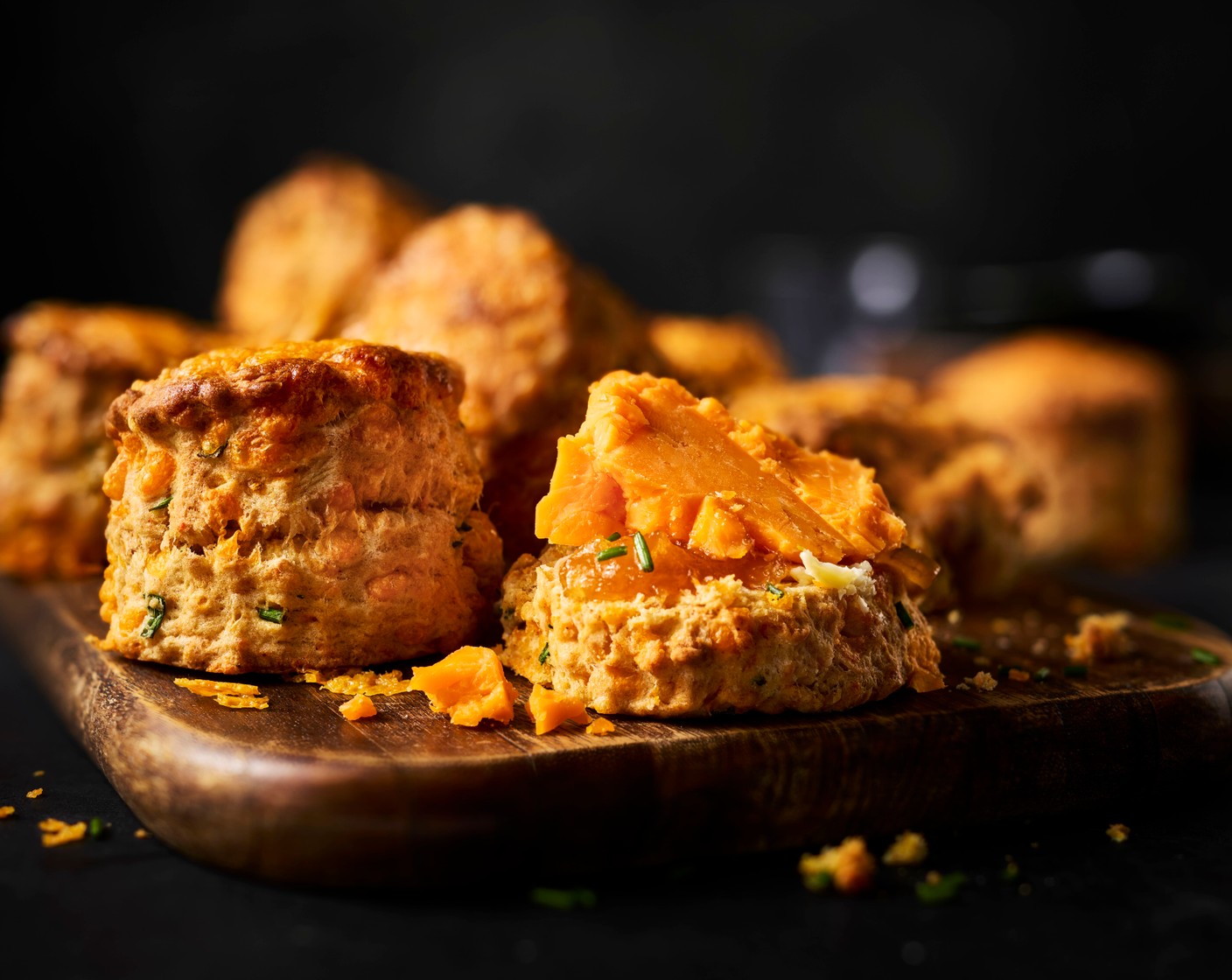 step 8 Bake for around 12-14 minutes, until well risen and golden. Serve with the butter (50 g), sliced cheese (50 g) and a little chutney (2 tbsp).