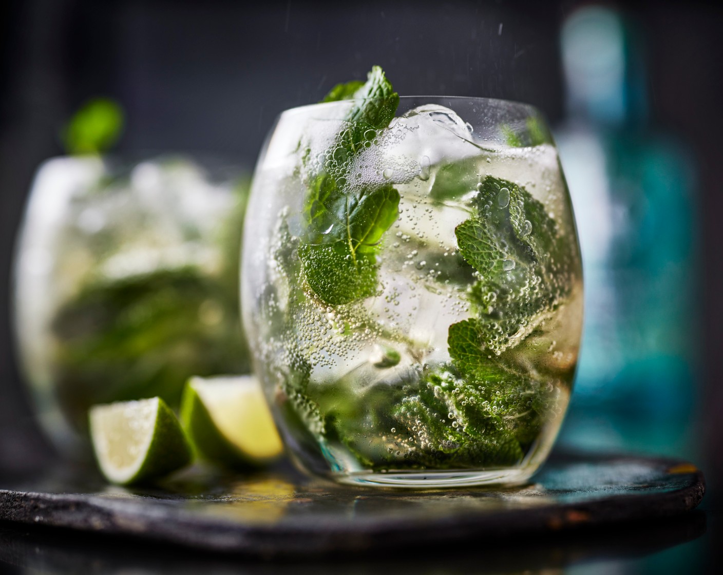 step 2 Fill the glasses with ice (1 handful) then top up with prosecco (240 ml) and soda water (50 ml). Garnish with a lime wedge (1) and extra mint leaves.