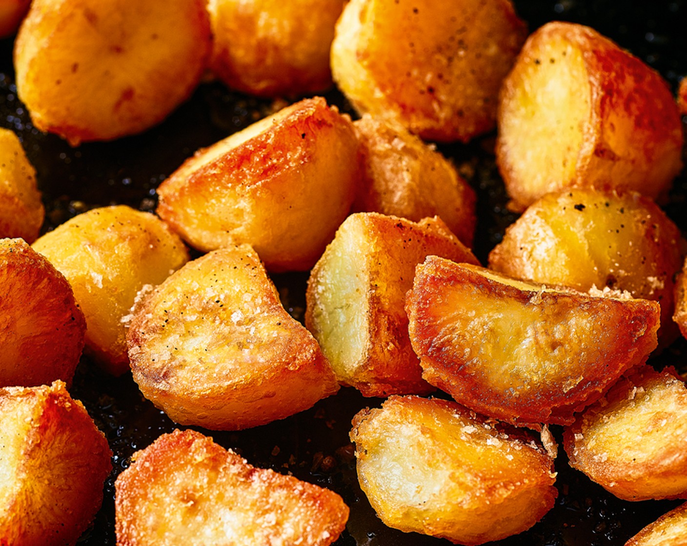 step 6 Remove from the oven and stir in the beef dripping (1 tbsp) then return to the oven for a further 15-20 minutes until golden and crisped to perfection. Once cooked, season with the oak smoked sea salt flakes (1 tsp)