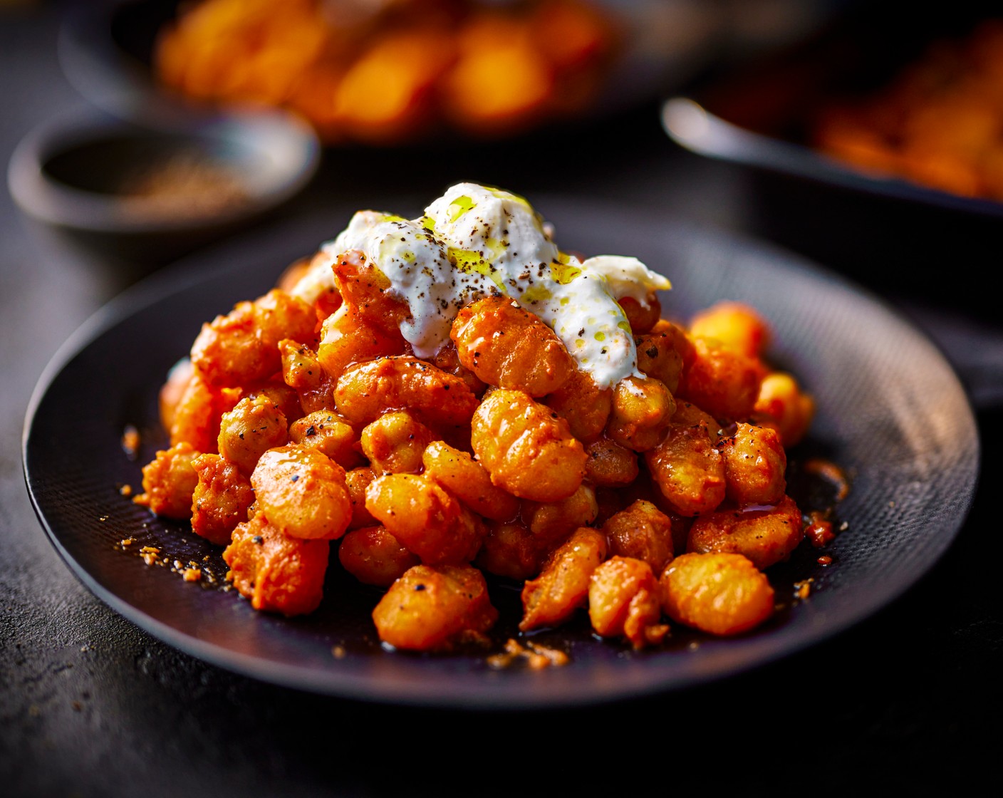 step 4 Tear the burrata (1 pack) on top, then drizzle with a little olive oil and finish with a grind of black pepper.