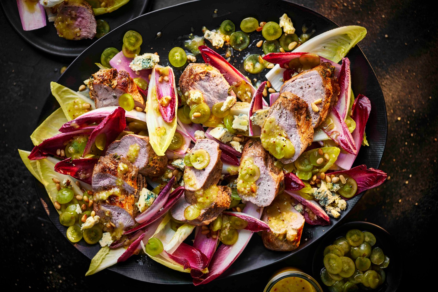 Pan fried pork with pickled grapes and chicory recipe