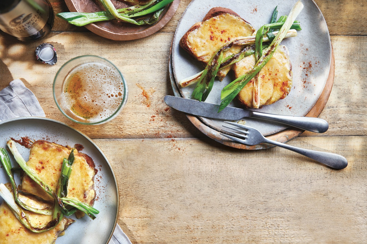 Oozy rarebit with charred spring onions