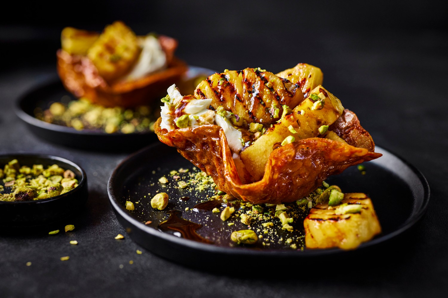 Caramelised rum pineapple brandy baskets with lime coconut cream recipe
