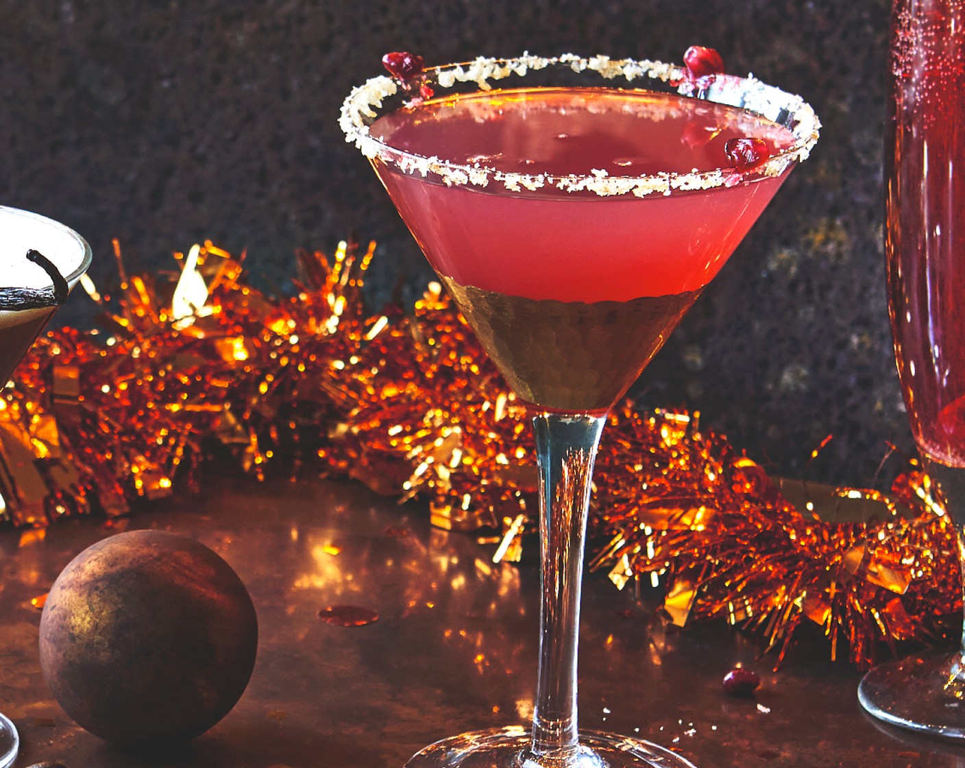 step 3 Top up with the Light pink grapefruit tonic water (100 ml) and garnish with a few M&S pomegranate rubies (as needed).