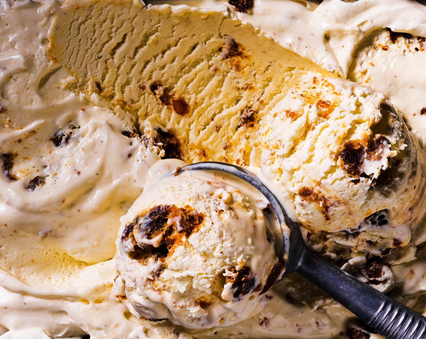 step 2 Scoop the ice cream into bowls and top with extra Christmas cake and a glug of amaretto liqueur (to taste) if you like.